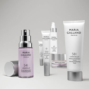 Woman cleansing her face gently