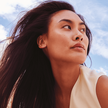 fingers dipping in cleanser