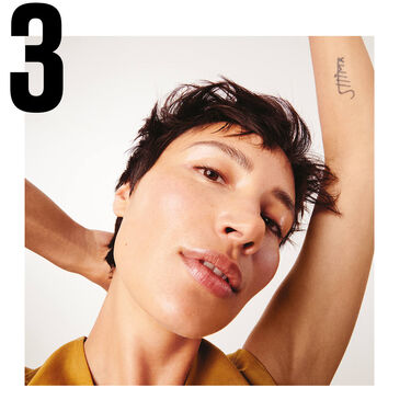 hands holding cleansers