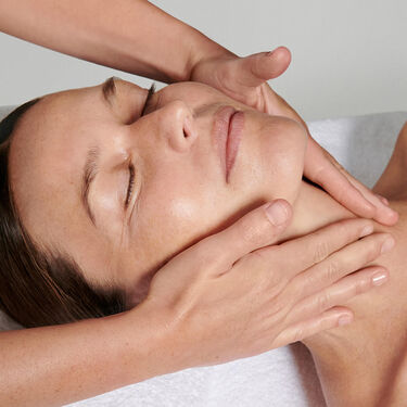 Women with cleanser on their faces 