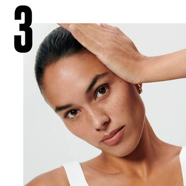 hands holding cleansers