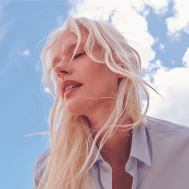 Women with cleanser on their faces 